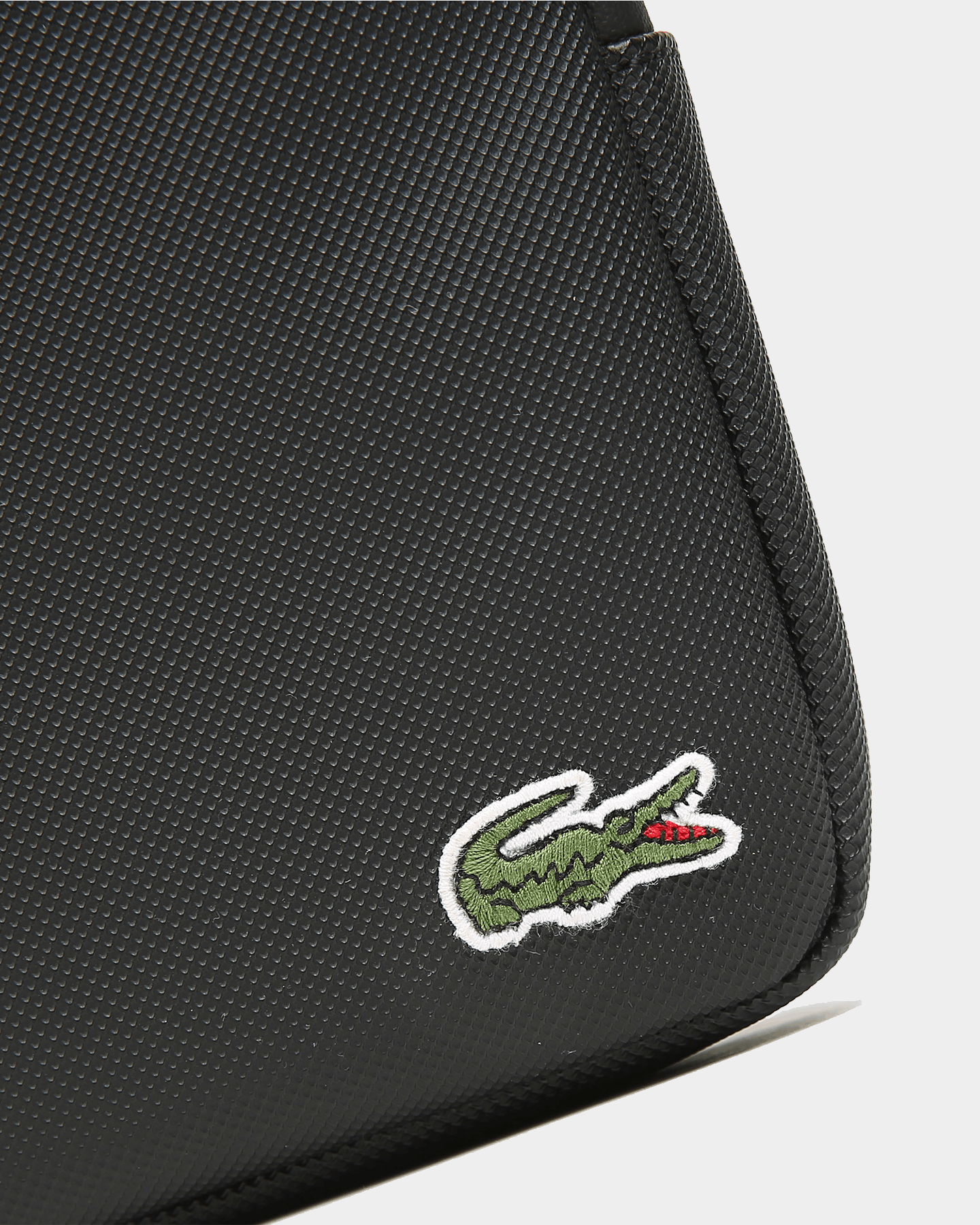 lacoste flat crossover bag