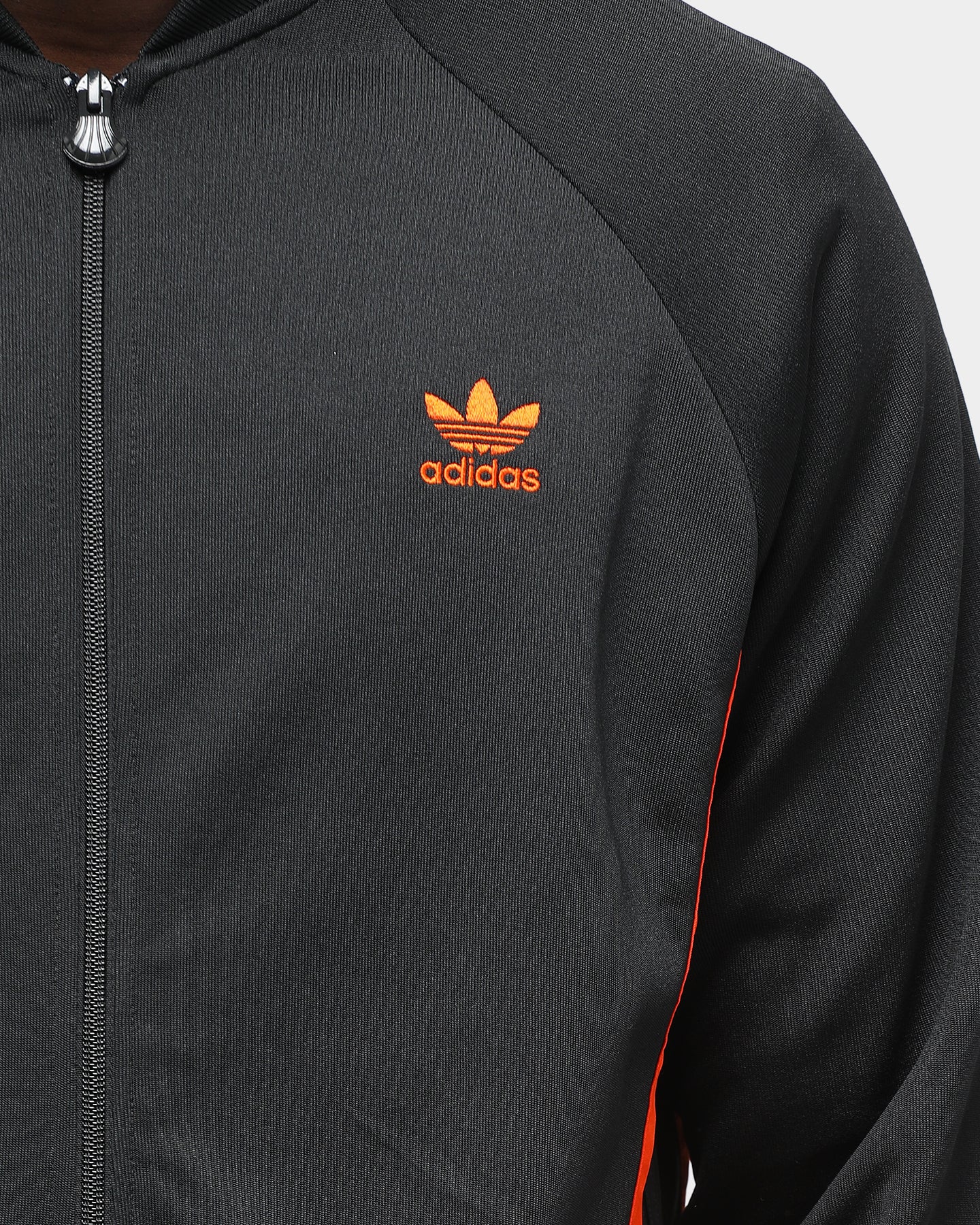 black and orange adidas jacket