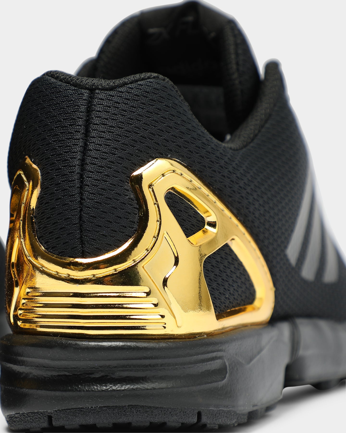adidas flux black and gold