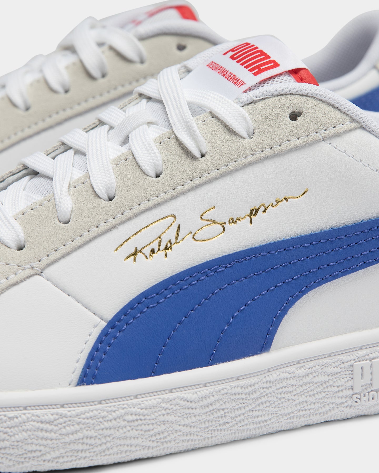 puma red white and blue sneakers