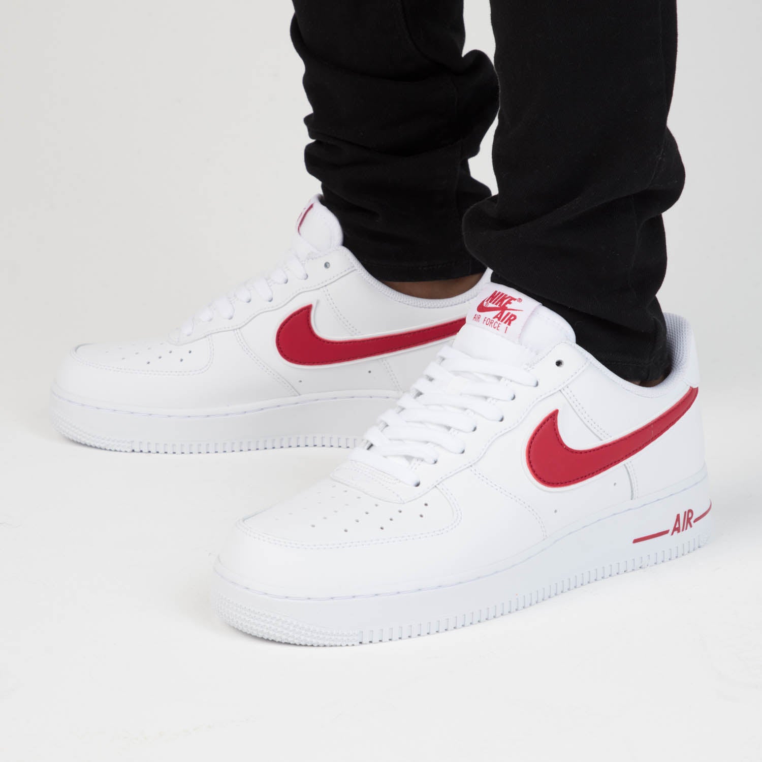 white air force with red tick