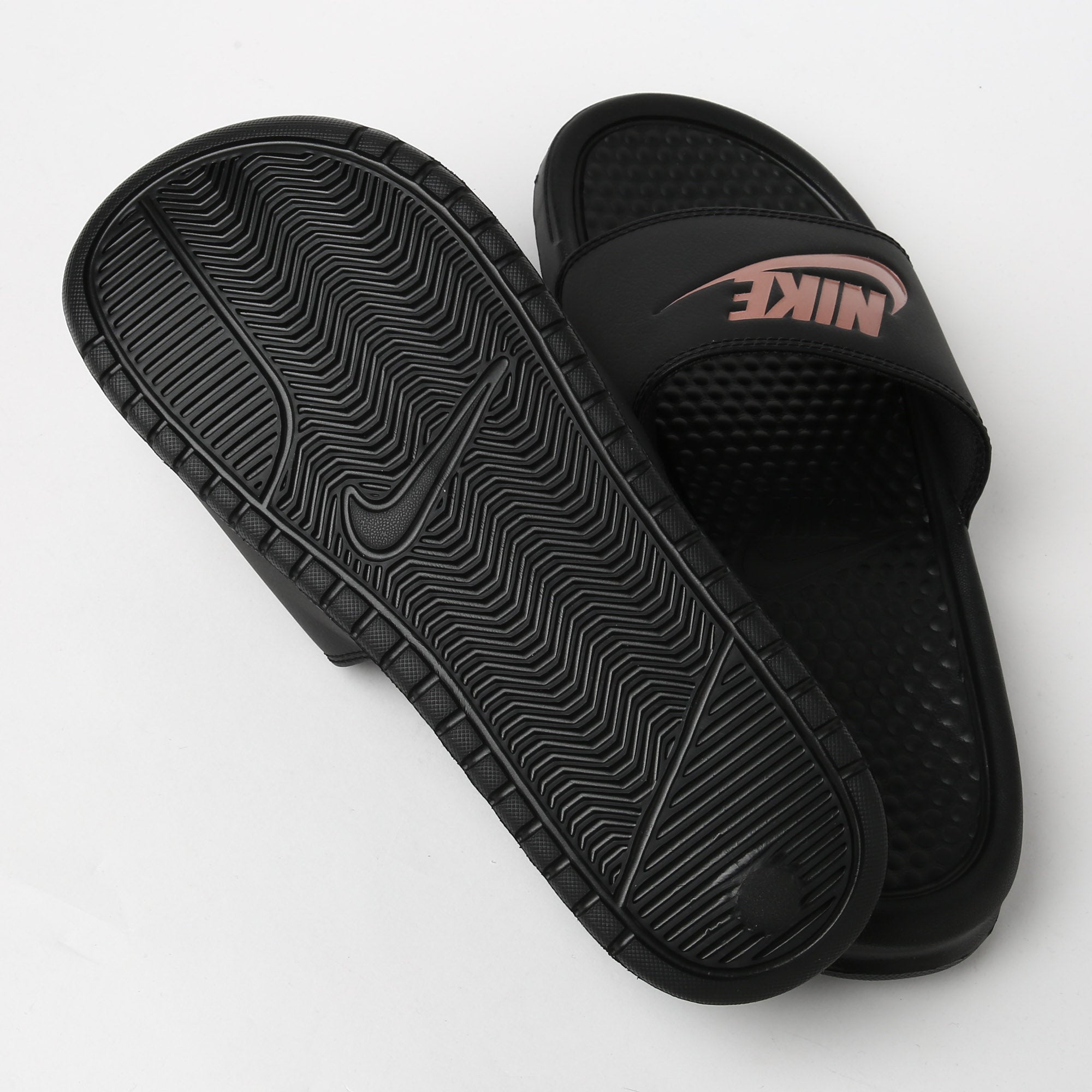 rose gold nike sliders