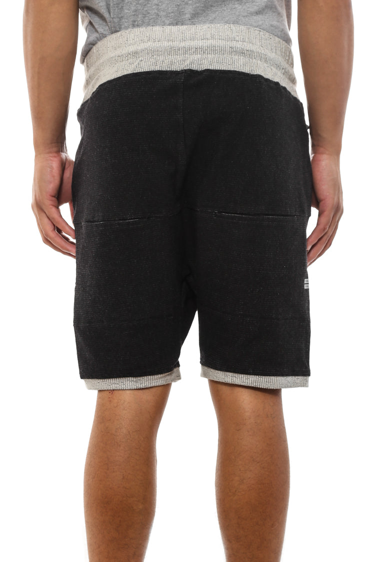 black trackie shorts